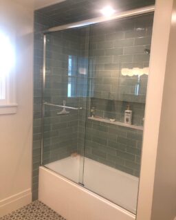 Taller bypass door in polished stainless steel. Love this tile color!